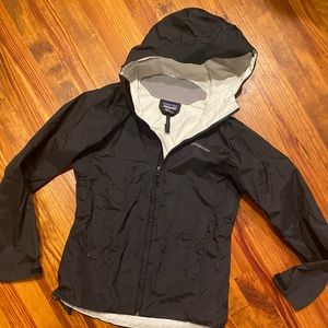 Patagonia raincoat black women’s size medium. NW/OTags